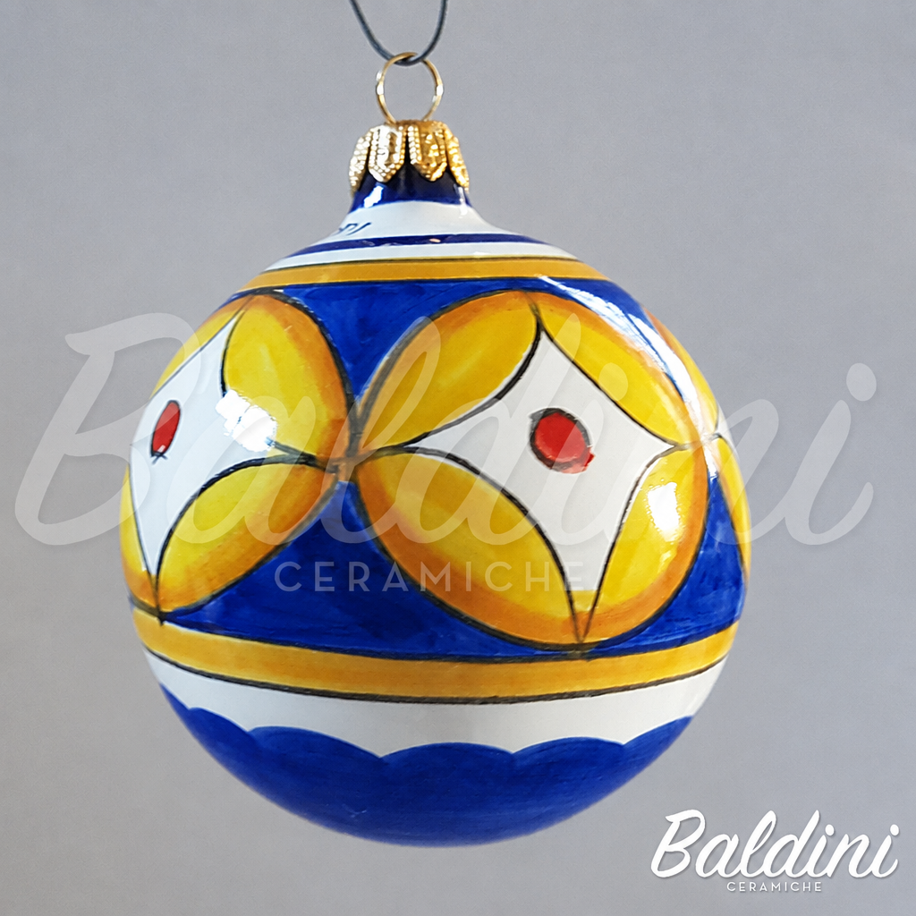 Pallina geometrica con parti celesti trasformate in blu scuro